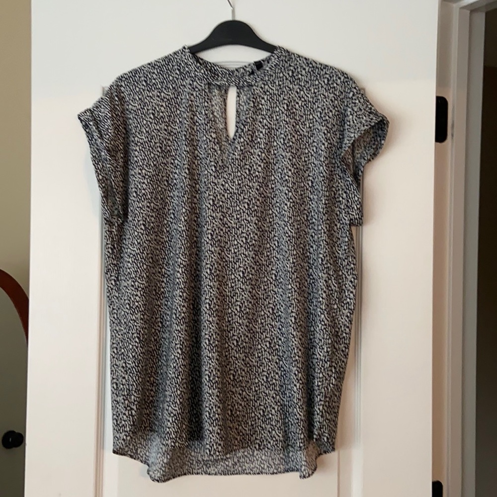 Keyhole front and back, rolled sleeve blouse